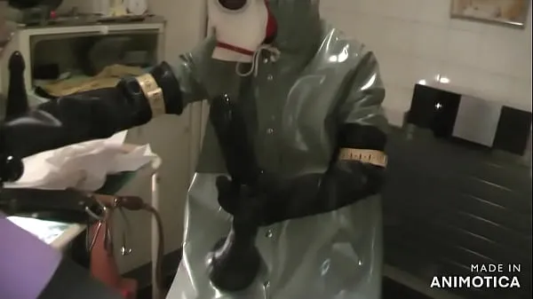 Gorące Rubbernurse Agnes - Heavy Rubber green clinic gown with hood and white gasmask - deep pegging with two colonoscope-style dildos - final deep analfisting with thick chemical gloves and cum fajne klipy